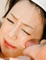 Rina Yuuki Asian with covered eyes screams from vibrator on peach