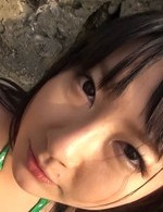 Megumi Haruka Asian busty strokes and licks dong head outdoor